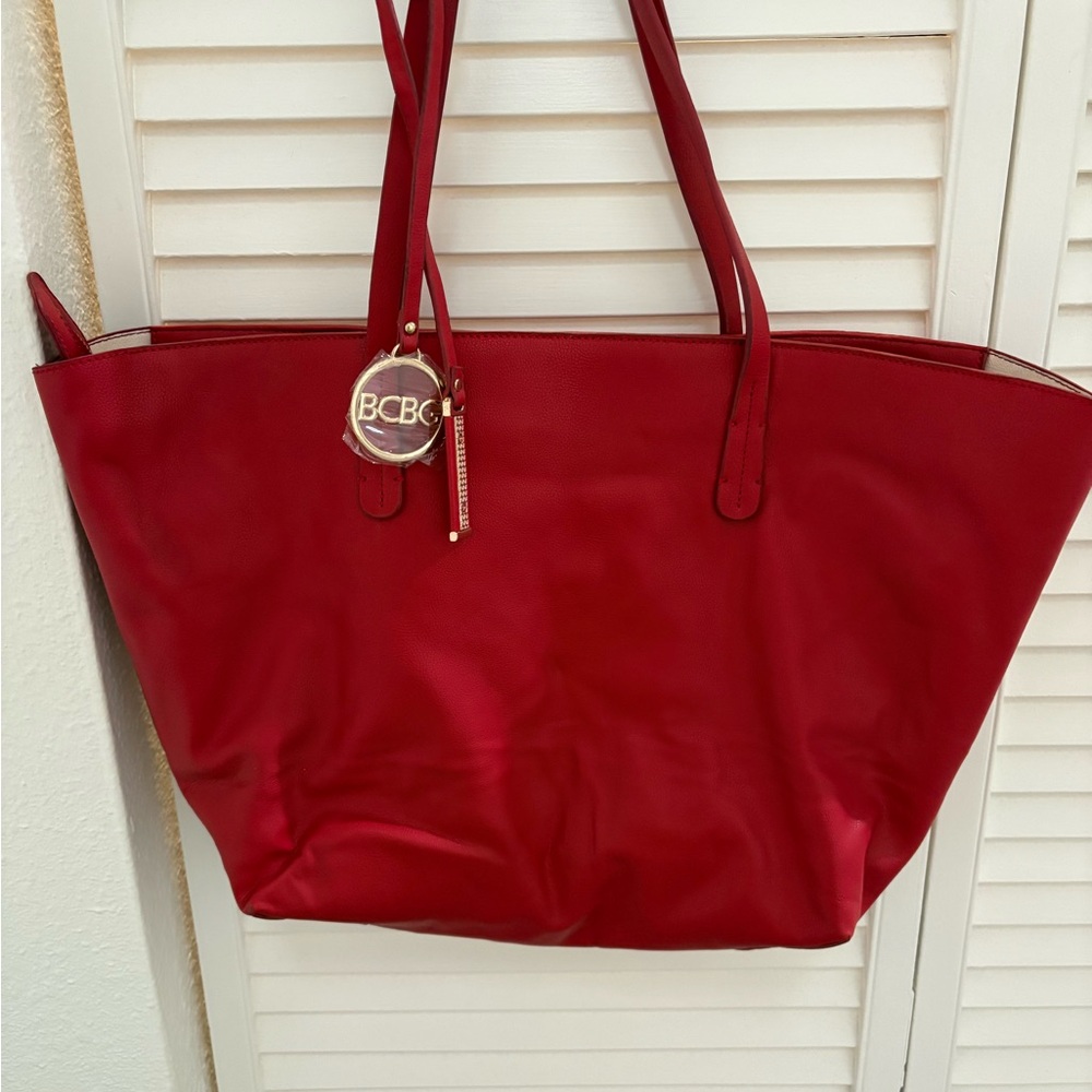 New BCBG Red Women's Tote Bag With Matching Cosmetic Pouch.